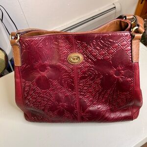 Tignanello leather shoulder bag in rich Bordeaux with floral embossed design